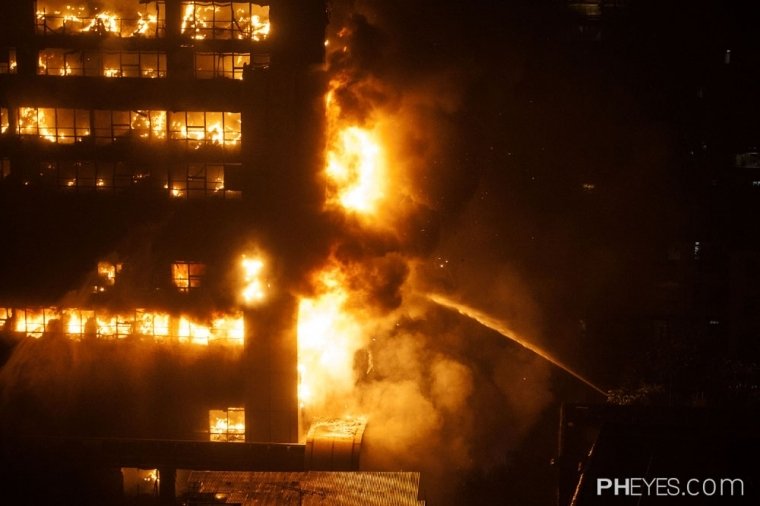 广州起义路一烂尾楼火灾现场组图