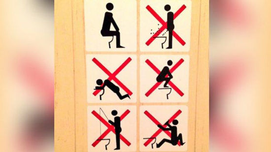 俄罗斯索契冬奥会的厕所里的标牌，“禁止钓鱼”一项十分抢眼。