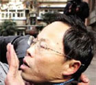 张显给药父通电称可下跪