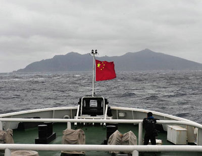 中日公务船敏感日硬碰硬 中国海警钓岛再出招