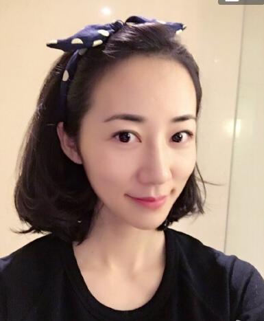 韩雪晒短发美照 戴蝴蝶结发箍俏皮可爱(图)