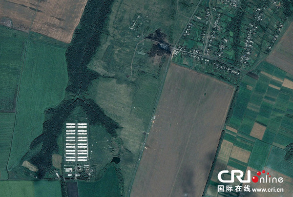 当地时间2014年7月21日，数字地球发布的卫星图显示马航MH17航班在乌克兰坠毁地点景象。图片来源：DigitalGlobe/ScapeWare3d/Getty Images/CFP