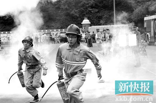 越秀消防技能比拼 志愿者一样够专业|干粉灭火