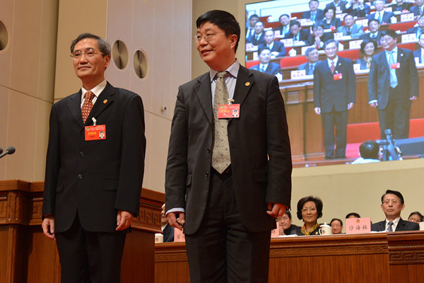 新当选市政协常委杨建荣（右）与顾国林亮相