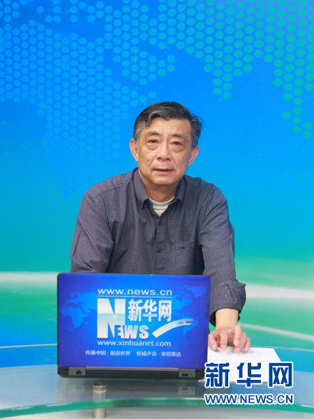 彭施鲁之子彭越关在采访现场。