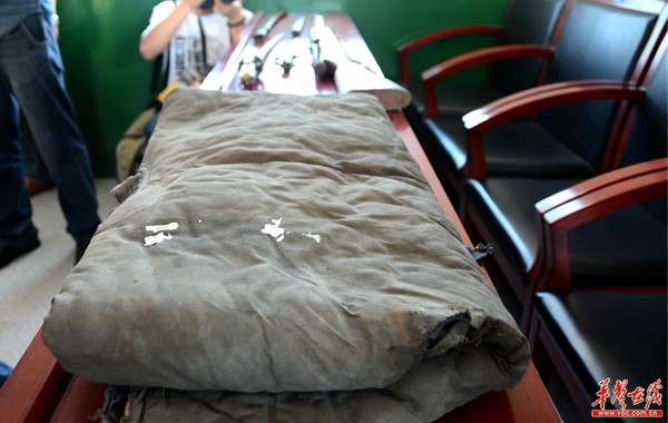 图为厂窖惨案部分陈列文物。记者 龙腾 摄