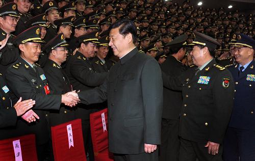 2012年12月5日，习近平在北京会见第二炮兵第八次党代表大会代表。新华社记者李刚摄