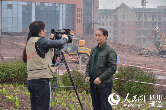 作为医教园的负责人罗太荣心中早有蓝图。（毛建军 摄）