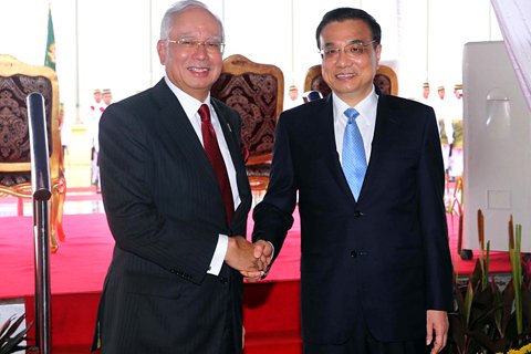 李克强总理23日在吉隆坡同马来西亚总理纳吉布举行会谈。图/中国政府网