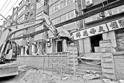 北京朝阳区150余家开墙打洞商户将恢复原貌