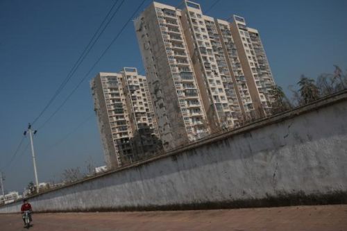 人民日报客户端: 拆除小区围墙 不是拍脑袋决定