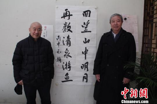 图为国画大师范扬和国际奥委会副主席于再清。