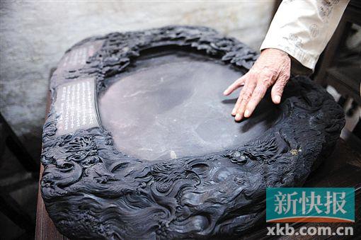 ■程文作品《九龙驭天砚》,重逾300斤,现市场价值约150万元。