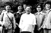 （邓小平与恢复高考后的第一批大学生在一起。）  
1977年73岁的邓小平第三次迈进中南海，复职仅两周后，1977年8月4日，邓小平迅速与30多位科学家举行了座谈会，当年便恢复了中断了11年的高考。由于准备仓促，印刷试卷的纸张不敷，邓小平还亲自下令调用印刷《毛泽东选集》的纸张。对考生家庭出身条件的限制，也因邓小平的反对而取消。这些在当时极为大胆的举措让更多的人看到了国家复兴的希望。


