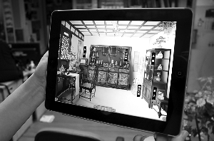 　　“竹镂文心——上海博物馆竹刻艺术特展”的iPad应用主界面，以上博收藏的明清家具为设计，再组织成为书房场景。