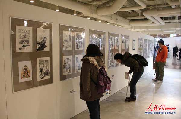 万代会场展示大量漫画原稿（人民网记者贾文婷摄）