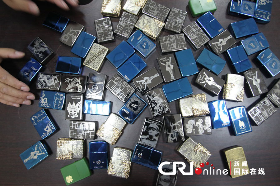 2012年6月5日，重庆，各种各样假“ZIPPO”打火机制作非常逼真。图片来源：cfp
