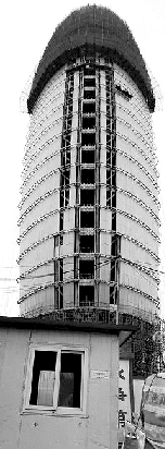 建筑,还看"土豪金" 方圆大厦 位于北京cbd正在建设中的人民日报社新