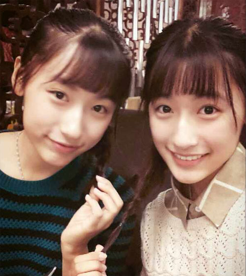 复旦"双胞胎姐妹花"网路走红 穿搭时尚长相甜美