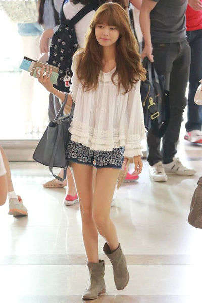 少女时代机场照 百变造型备受注目