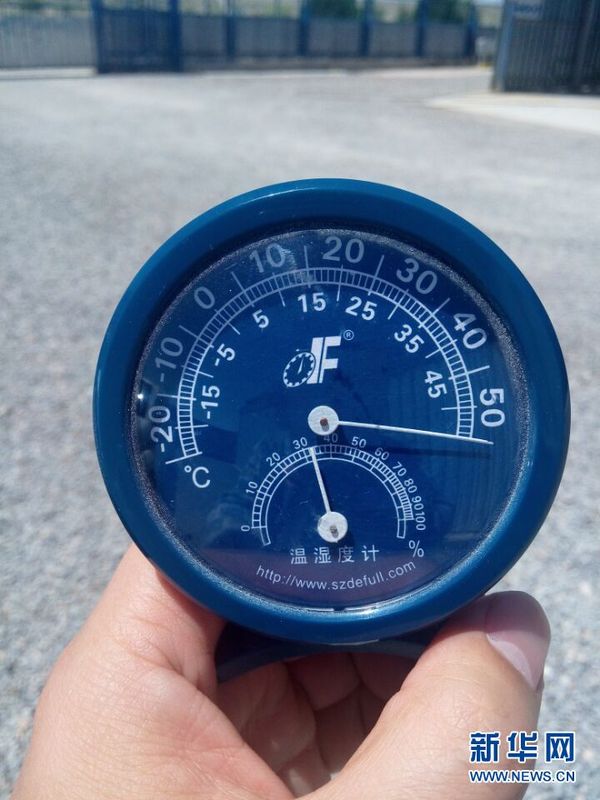 实拍55度高温下的天然气田作业人员(高清组图)