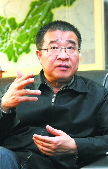 杨庆育 首席记者 钟志兵 摄黄朝永 首席记者 钟志兵 摄"直辖15年来